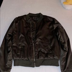 A dark green bomber jacket